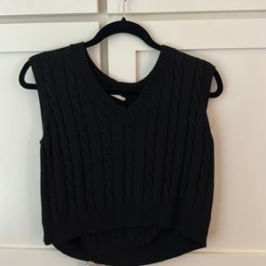 Black sweater vest